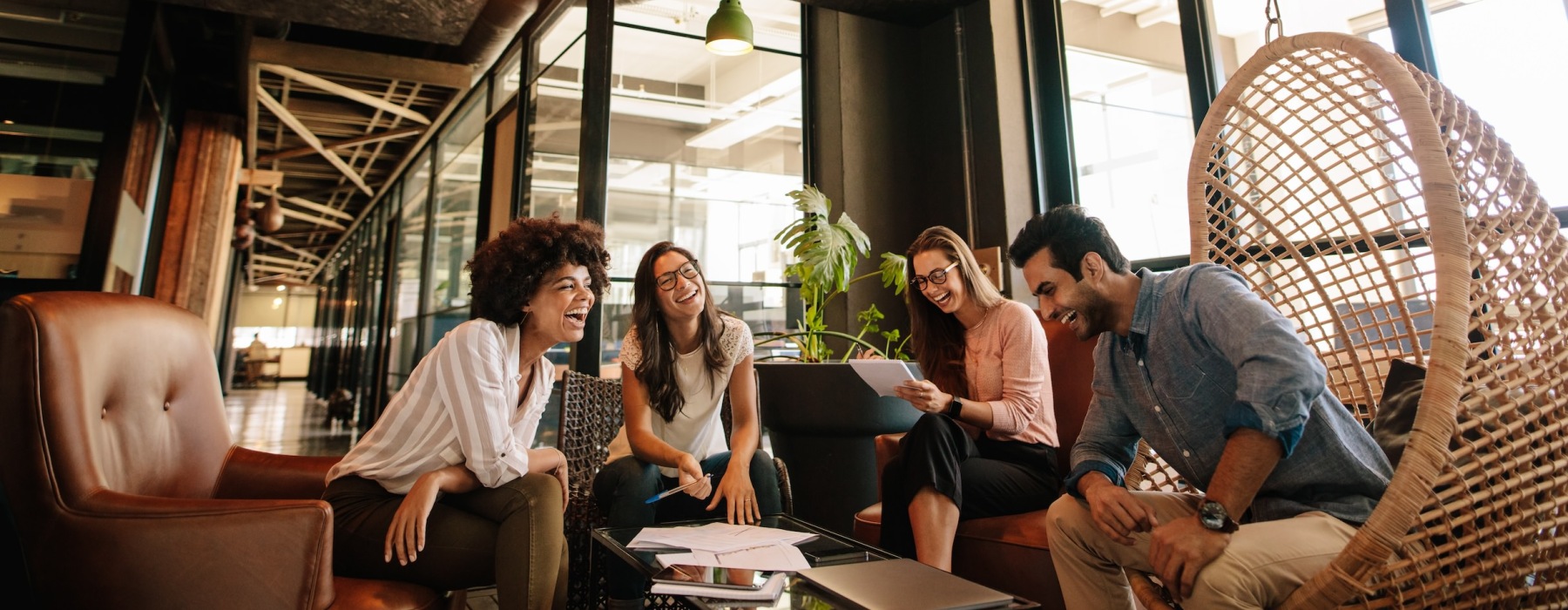 a group of people sitting down talking